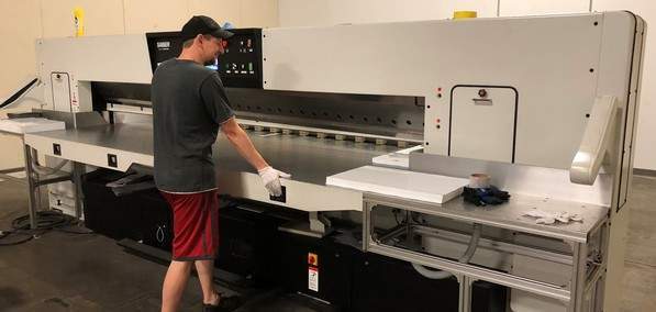 E & T Plastics purchases Colter & Peterson’s Saber XT paper cutter