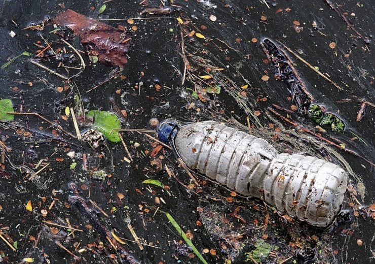 Plastic bottle in river (Pixabay)